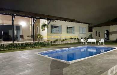 Imagem: A casa possui 5 Dormitórios, 5 Banheiros, 2 Vagas na garagem