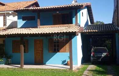 Imagem: A casa possui 3 Dormitórios, 1 Banheiro, 4 Vagas na garagem