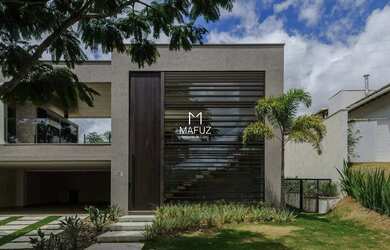 Imagem: A casa possui 4 Dormitórios, 5 Banheiros, 355m² de Área e