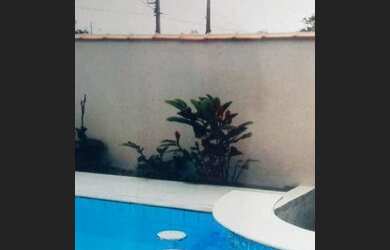 Imagem: A casa possui 5 Dormitórios, 5 Banheiros, 5 Vagas na garagem