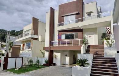 Imagem: A casa possui 5 Dormitórios, 5 Banheiros, 5 Vagas na garagem