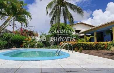 Imagem: A casa possui 4 Dormitórios, 5 Banheiros, 5 Vagas na garagem