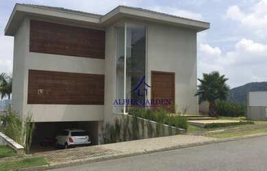 Imagem: A casa em condomínio possui 4 Dormitórios, 5 Banheiros, 4