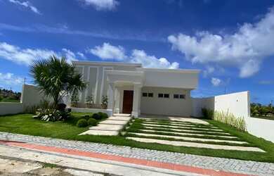 Imagem: A casa em condomínio possui 3 Dormitórios, 3 Banheiros, 200m²