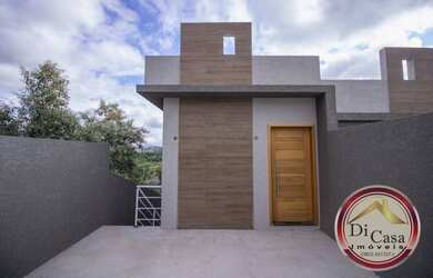 Imagem: A casa possui 2 Dormitórios, 3 Banheiros, 2 Vagas na garagem