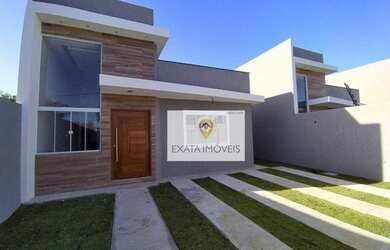 Imagem: A casa possui 3 Dormitórios, 3 Banheiros, 2 Vagas na garagem