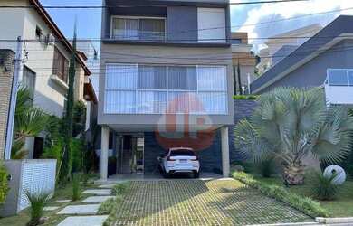 Imagem: A casa em condomínio possui 4 Dormitórios, 5 Banheiros, 4