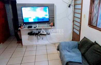 Imagem: A casa à venda possui 2 Dormitórios, 1 Banheiro, 2 Vagas na