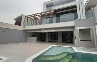 Imagem: A casa em condomínio possui 4 Dormitórios, 5 Banheiros, 2