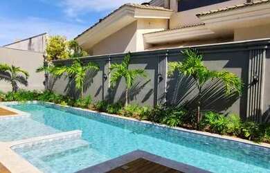 Imagem: A casa em condomínio possui 4 Dormitórios, 5 Banheiros, 4