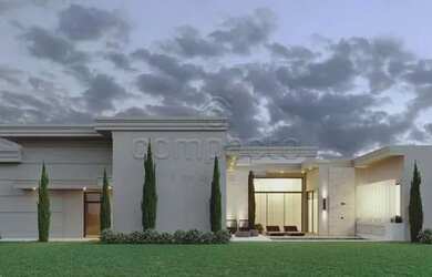 Imagem: A casa em condomínio à venda possui 3 Dormitórios, 5 Banheiros