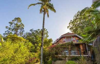 Imagem: A casa possui 1 Dormitório, 2 Banheiros, 2 Vagas na garagem