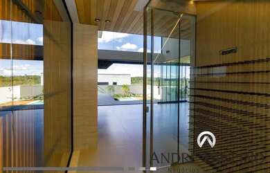 Imagem: A casa em condomínio possui 4 Dormitórios, 4 Banheiros, 349m²