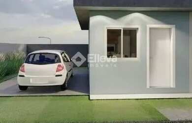 Imagem: A casa possui 2 Dormitórios, 1 Banheiro, 2 Vagas na garagem