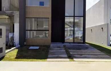 Imagem: A casa possui 4 Dormitórios, 5 Banheiros, 3 Vagas na garagem