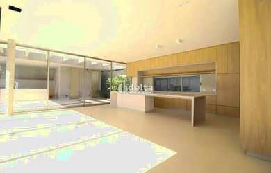 Imagem: A casa possui 3 Dormitórios, 5 Banheiros, 3 Vagas na garagem