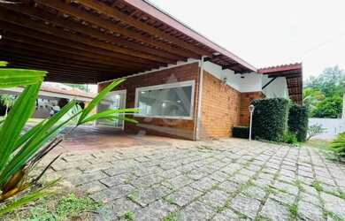 Imagem: A casa possui 3 Dormitórios, 5 Banheiros, 5 Vagas na garagem