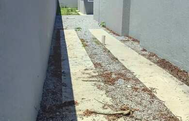 Imagem: A casa possui 2 Dormitórios, 2 Banheiros, 3 Vagas na garagem