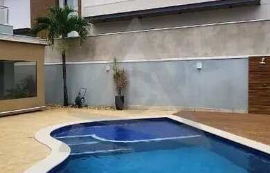 Imagem: A casa em condomínio possui 4 Dormitórios, 5 Banheiros, 5