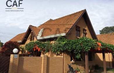 Imagem: A casa em condomínio à venda possui 4 Dormitórios, 5 Banheiros