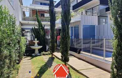 Imagem: A casa em condomínio possui 4 Dormitórios, 5 Banheiros, 2