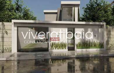 Imagem: A casa possui 3 Dormitórios, 4 Banheiros, 2 Vagas na garagem