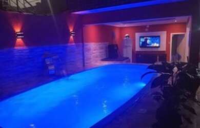 Imagem: A casa possui 3 Dormitórios, 3 Vagas na garagem e está localizado