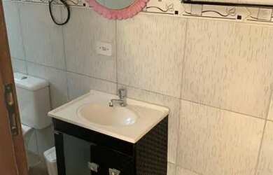 Imagem: A casa possui 2 Dormitórios, 3 Banheiros, 1 Vaga na garagem