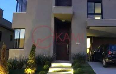 Imagem: A casa possui 4 Dormitórios, 5 Banheiros, 5 Vagas na garagem