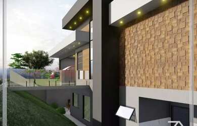 Imagem: A casa possui 3 Dormitórios, 5 Banheiros, 4 Vagas na garagem