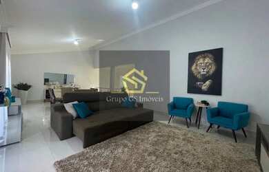 Imagem: A casa possui 3 Dormitórios, 3 Banheiros, 4 Vagas na garagem