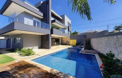 Imagem: A casa em condomínio possui 4 Dormitórios, 1 Banheiro, 4 Vagas