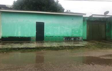 Imagem: A casa possui 2 Dormitórios, 1 Banheiro, 2 Vagas na garagem