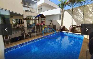 Imagem: A casa possui 4 Dormitórios, 5 Banheiros, 3 Vagas na garagem