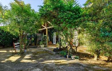 Imagem: A casa em condomínio possui 3 Dormitórios, 3 Banheiros, 277m²