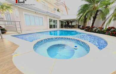 Imagem: A casa em condomínio possui 4 Dormitórios, 5 Banheiros, 5