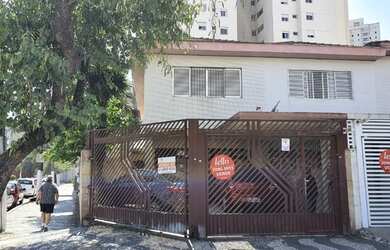 Imagem: A casa possui 3 Dormitórios, 4 Banheiros, 4 Vagas na garagem