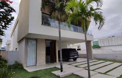 Imagem: A casa possui 4 Dormitórios, 5 Banheiros, 2 Vagas na garagem