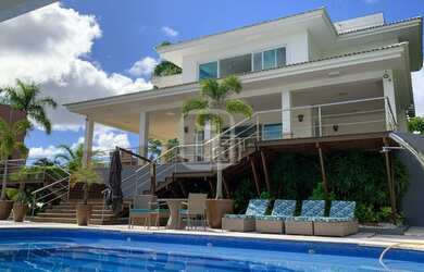 Imagem: A casa em condomínio possui 4 Dormitórios, 5 Banheiros, 4