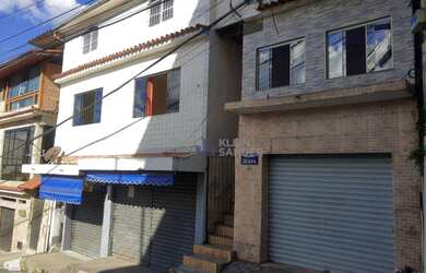 Imagem: A casa possui 3 Dormitórios, 4 Banheiros, 3 Vagas na garagem