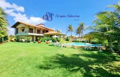 Imagem: A casa possui 5 Dormitórios, 5 Banheiros, 5 Vagas na garagem