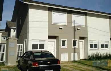 Imagem: A casa possui 2 Dormitórios, 3 Banheiros, 2 Vagas na garagem