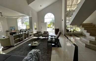 Imagem: A casa em condomínio possui 4 Dormitórios, 5 Banheiros, 4