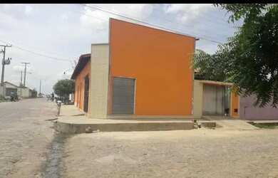 Imagem: A casa possui 3 Dormitórios, 3 Banheiros, 4 Vagas na garagem