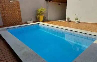 Imagem: A casa possui 2 Dormitórios, 4 Banheiros, 4 Vagas na garagem