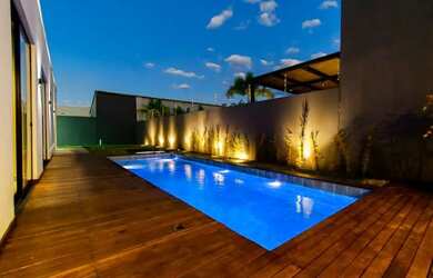 Imagem: A casa em condomínio possui 4 Dormitórios, 5 Banheiros, 3