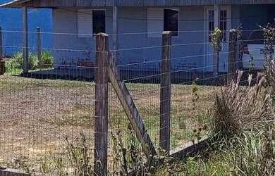 Imagem: A casa possui 2 Dormitórios, 1 Banheiro, 1 Vaga na garagem