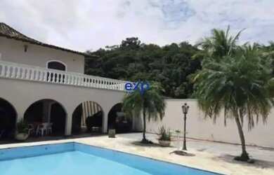 Imagem: A casa possui 5 Dormitórios, 5 Banheiros, 3 Vagas na garagem