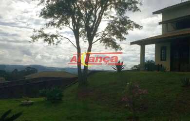 Imagem: A casa possui 3 Dormitórios, 3 Banheiros, 5 Vagas na garagem