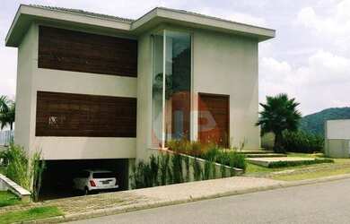 Imagem: A casa em condomínio possui 4 Dormitórios, 5 Banheiros, 4